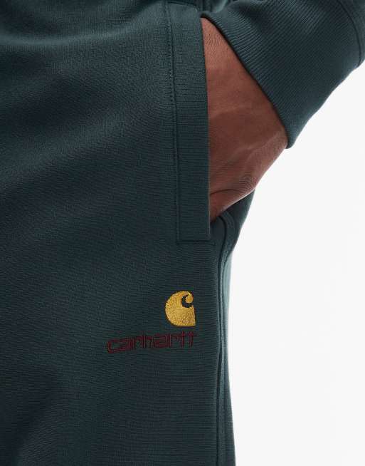 Joggers verde oscuro con detalle de texto American de Carhartt WIP, 5 de 5