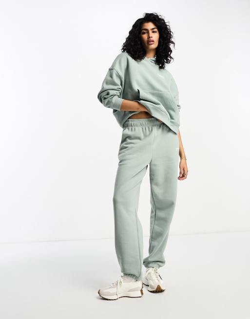 Joggers verde salvia con cremallera Linear Heritage de New Balance