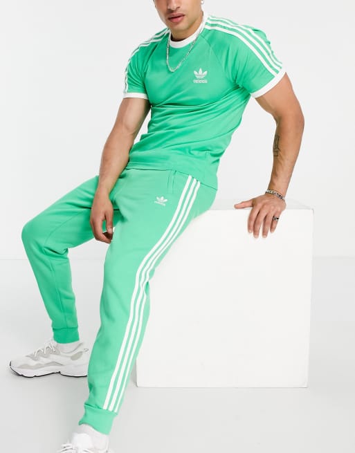 Joggers verdes con tres rayas adicolor de adidas Originals ASOS