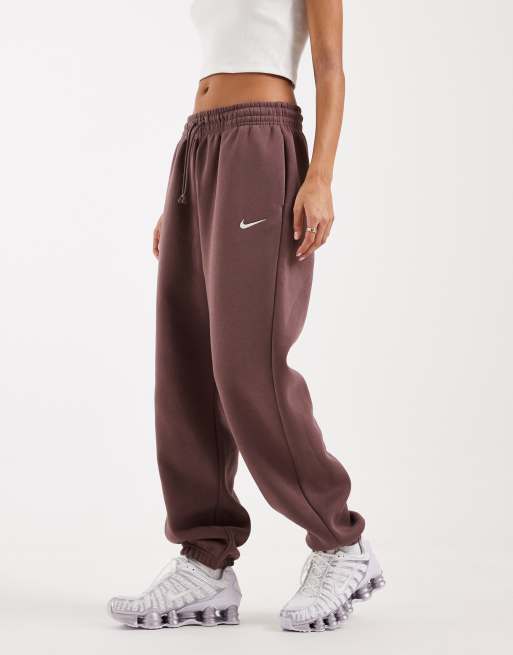 Joggers violeta oscuro extragrandes de talle alto con bajos ajustados Phoenix Fleece de Nike, 2 de 5