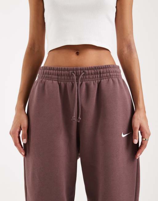 Joggers violeta oscuro extragrandes de talle alto con bajos ajustados Phoenix Fleece de Nike, 3 de 5