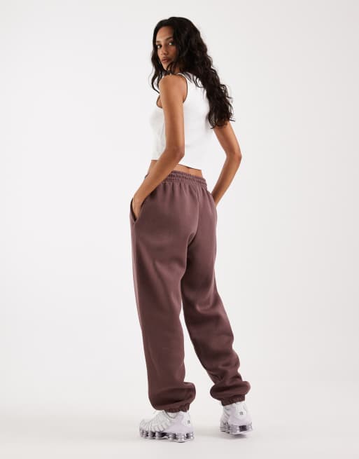 Joggers violeta oscuro extragrandes de talle alto con bajos ajustados Phoenix Fleece de Nike, 5 de 5