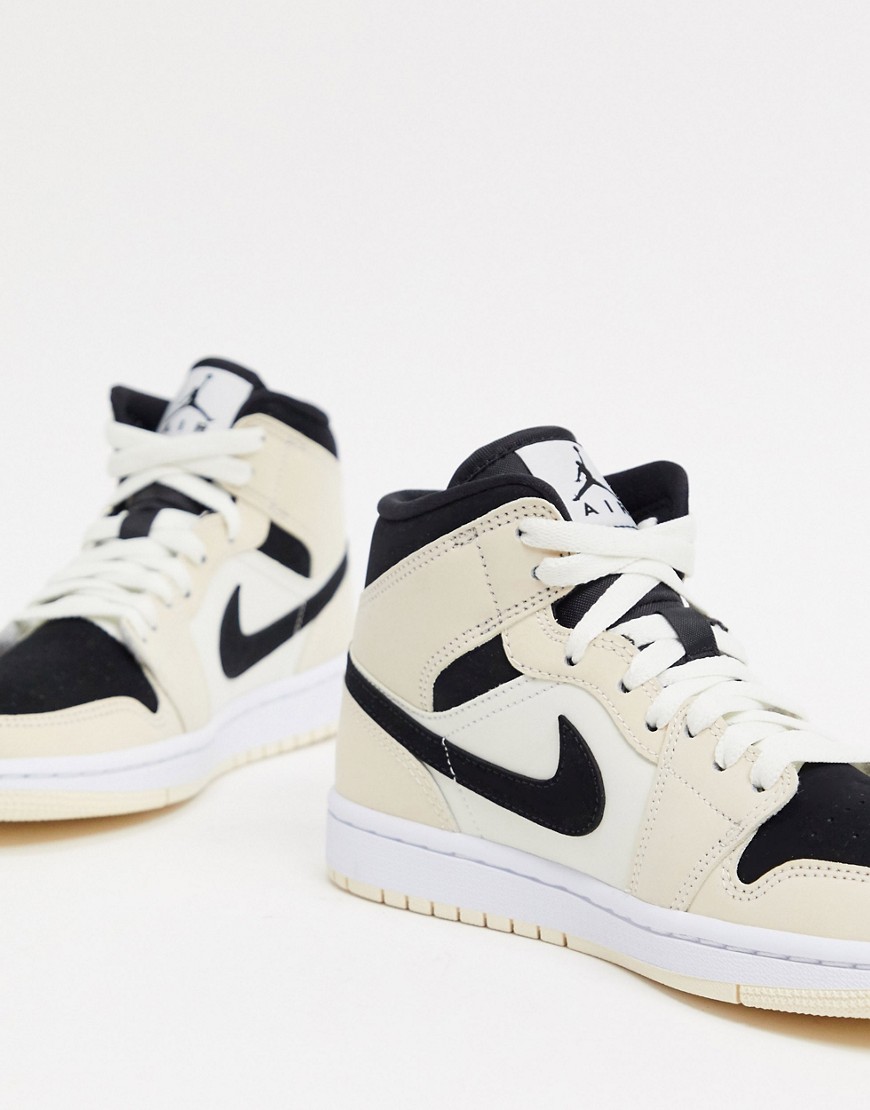 Jordan Air 1 Mid trainers in cream and black-White