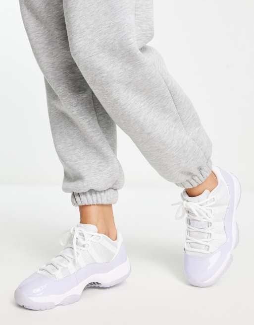 Jordan Air 11 Retro Low trainers in white and purple