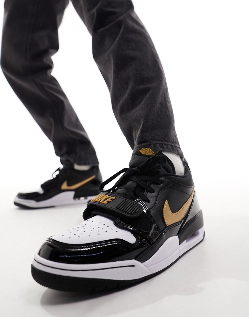 Jordan Air Legacy 312 Low trainers in black and gold