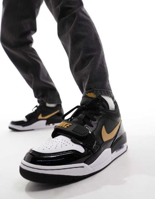 Jordan shoes best sale black and gold