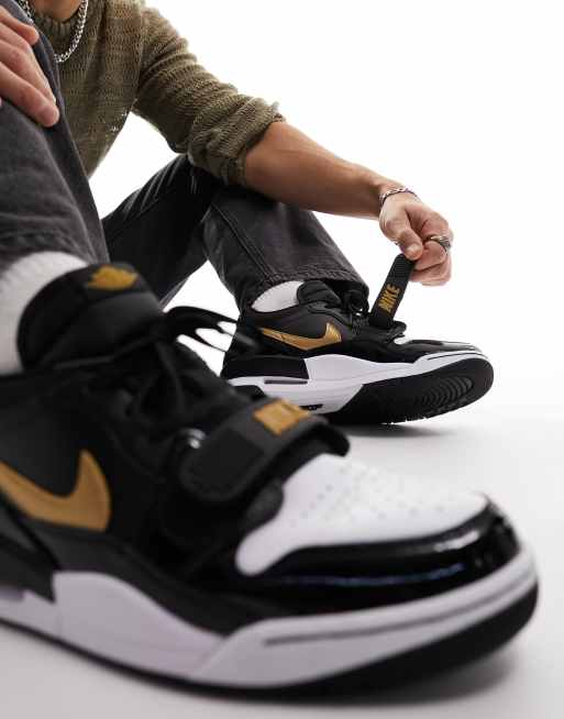 Air jordan legacy clearance 312 black and gold