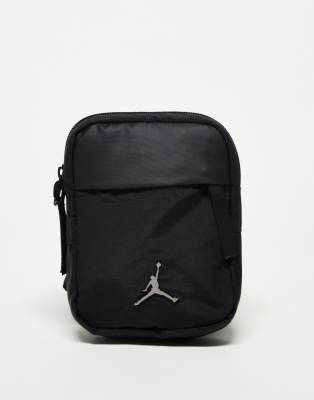 Jordan Airborne sling bag in black | ASOS