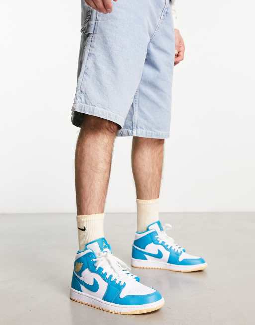 Jordan - AJ 1 - Halfhoge sneakers in blauw en wit met gouden details