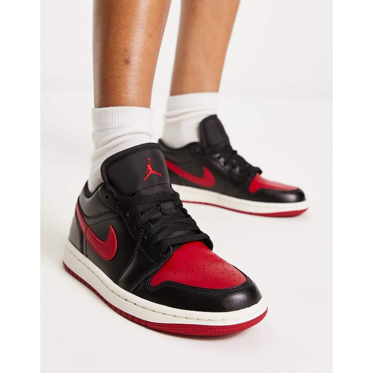 Jordan AJ1 Low trainers in black and gym red ASOS