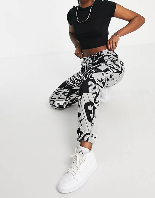 Women Jordan basketball all over print joggers in black and red 