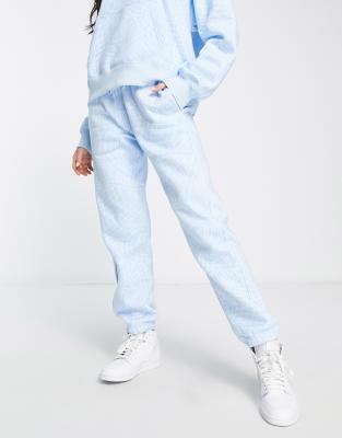 Jordan Brooklyn AOP fleece joggers in ice blue - ASOS Price Checker