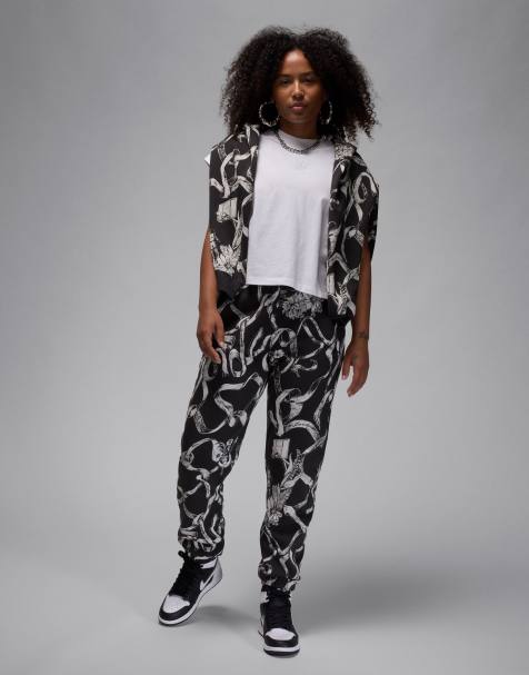 Jordan Brooklyn fleece all-over print sweatpants in black - view 1