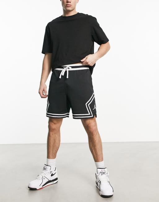 ASOS DESIGN oversized basketball shorts in black sporty mesh