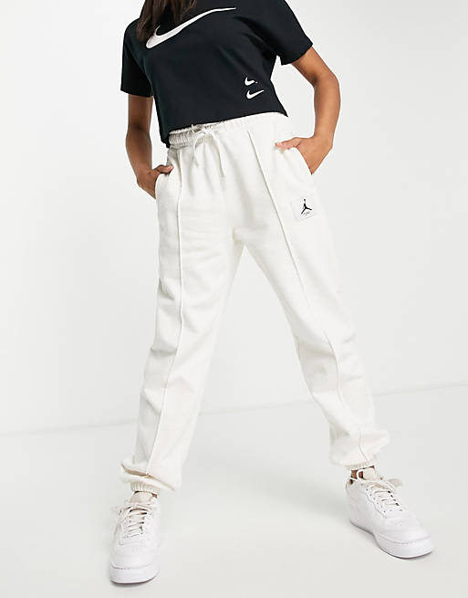 Jordan essential fleece joggers in off white