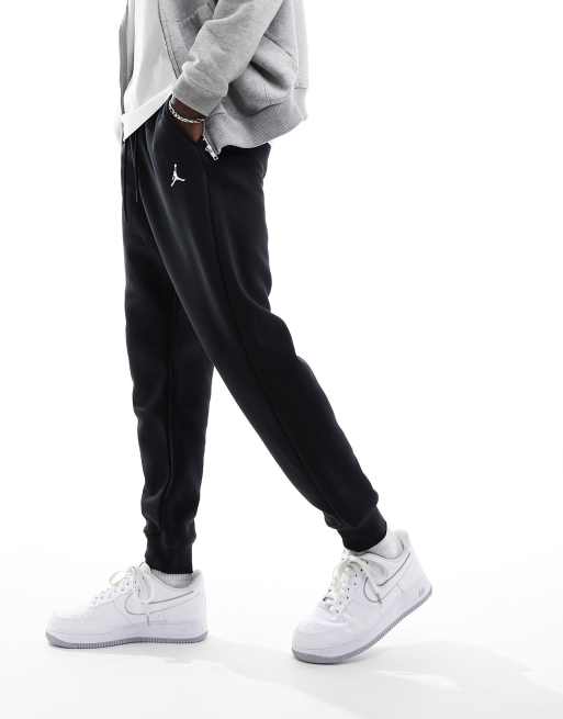 Black and best sale white jordan joggers