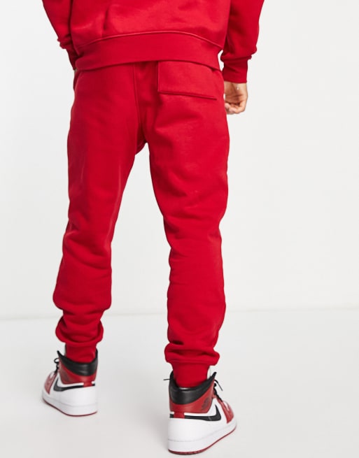 Jordan Essentials fleece pant in gym red