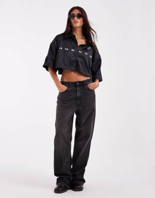 Jordan Fc Woven Cropped Graphic Shirt In Black