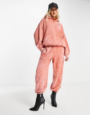 Jordan essential fleece joggers in arctic orange 51.06 Grazia