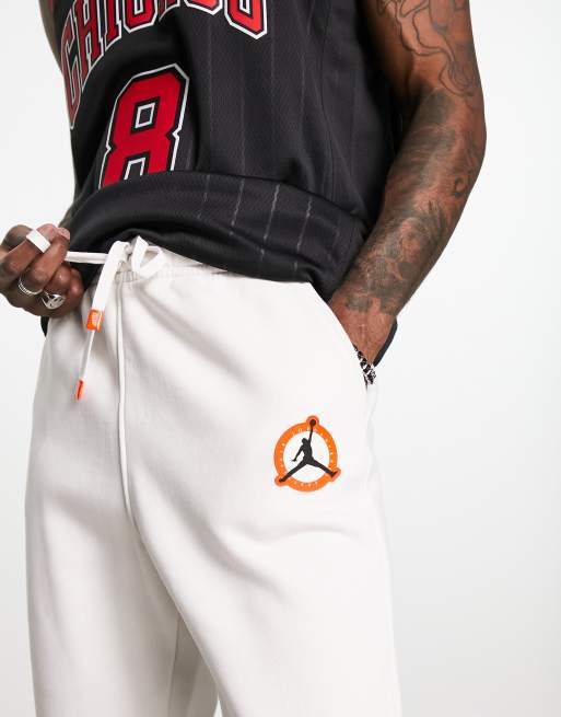 White and red sales jordan sweatpants