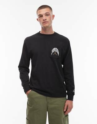 Jordan Jordan long sleeve t-shirt with pocket detail in black