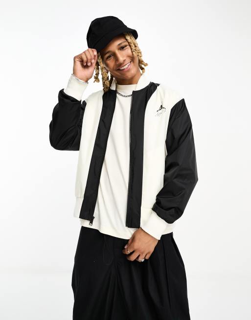 Black and white jordan store varsity jacket