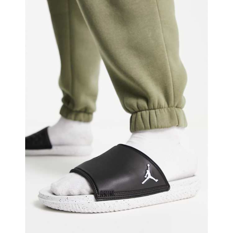 Jordan Play sliders in black and white ASOS