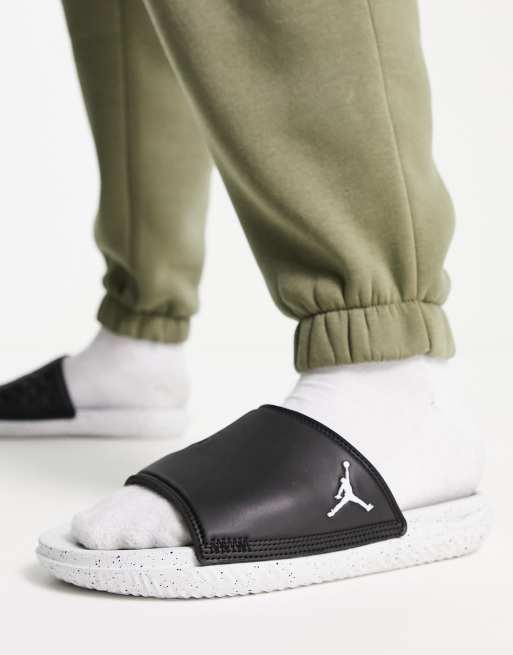 Jordan Play sliders in black and white ASOS