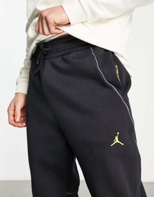 Black and store gold jordan joggers