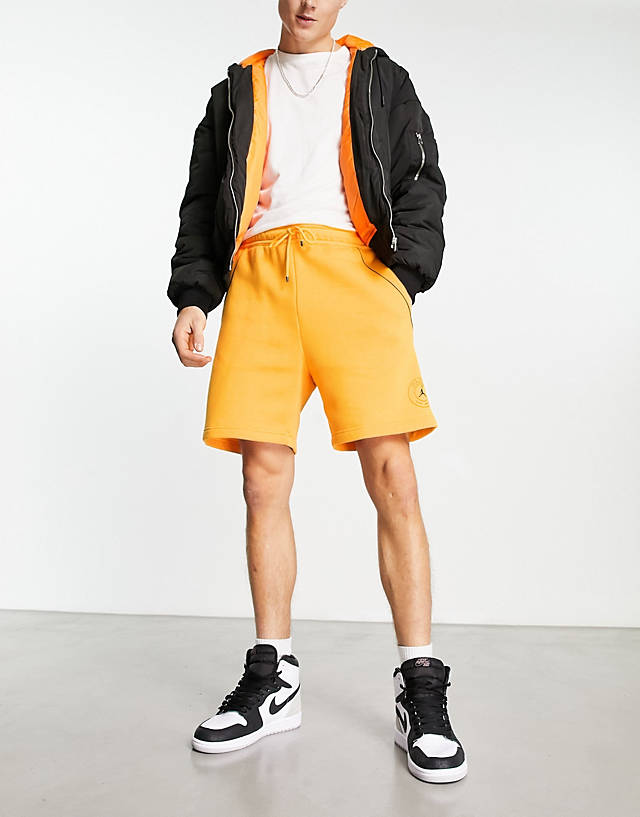Jordan - psg logo shorts in yellow
