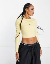 Nike Yoga Luxe Dri-FIT cropped long sleeve top in off white, ASOS