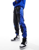 Under Armour Challenger Pro joggers in black and blue