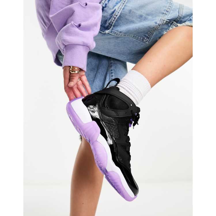 Black jordans hotsell with purple logo