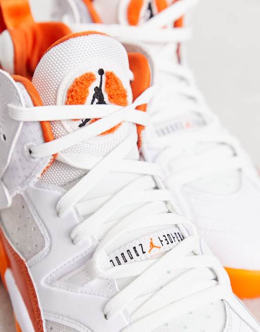 Orange white sale jordans