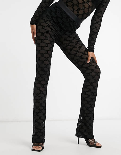 Juicy Couture co-ord flocked mesh flared logo trousers in black | ASOS