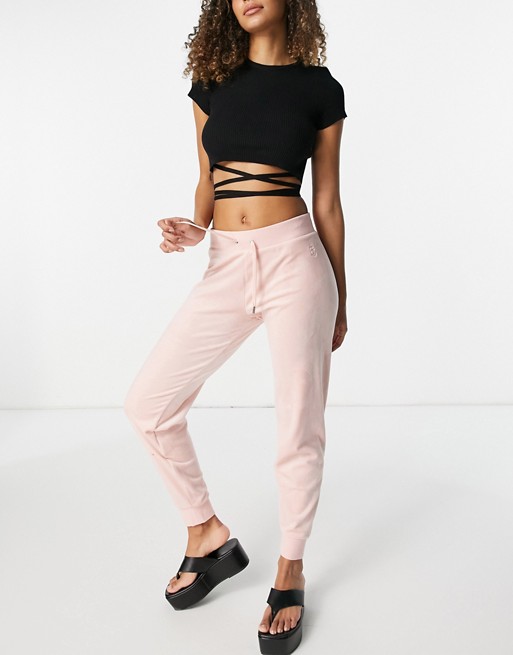 Juicy Couture velour joggers in pastel pink