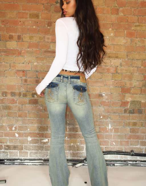 Juicy Couture crest logo low rise flare jean in midwash blue, 2 of 4