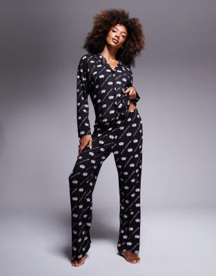 Juicy Couture - Elastische Pyjama-Hose in Schwarz mit Kronenmuster