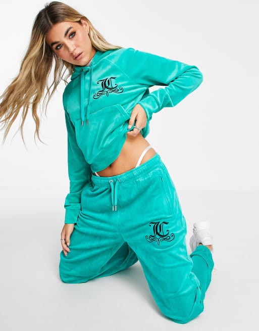 Juicy Couture - Felpa con cappuccio e strass in velour turchese dal taglio ristretto in coordinato