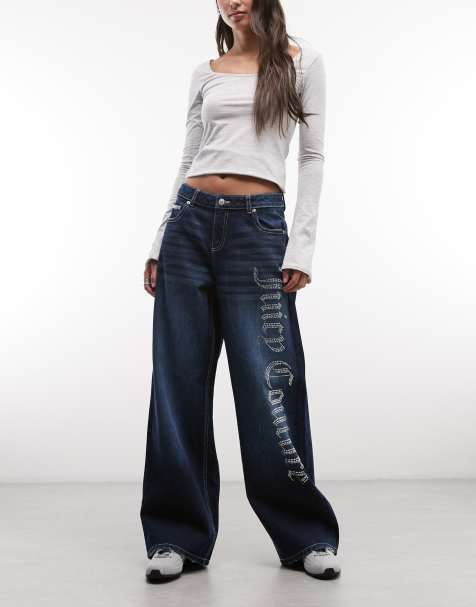 Juicy Couture - Jeans met halfhoge taille, wijde pijpen en siersteentjes in mid-wash blauw - view 1