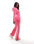 Juicy Couture velour rose logo low waisted trackies in hot pink (part of a set)