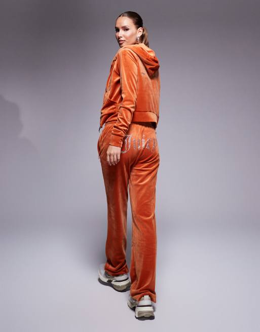 Orange velvet tracksuit on sale
