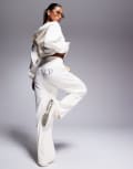[Juicy Couture] Juicy Couture velour wide leg trackies in white exclusive to ASOS XS Sugar swizzle