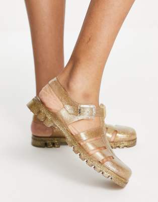 Juju jelly flat shoes in gold glitter