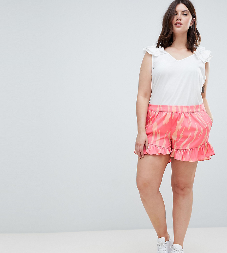 Plus-size shorts by Junarose Printed design Mid rise Side pockets Ruffle hem Stretch-back waist Regular fit - true to size