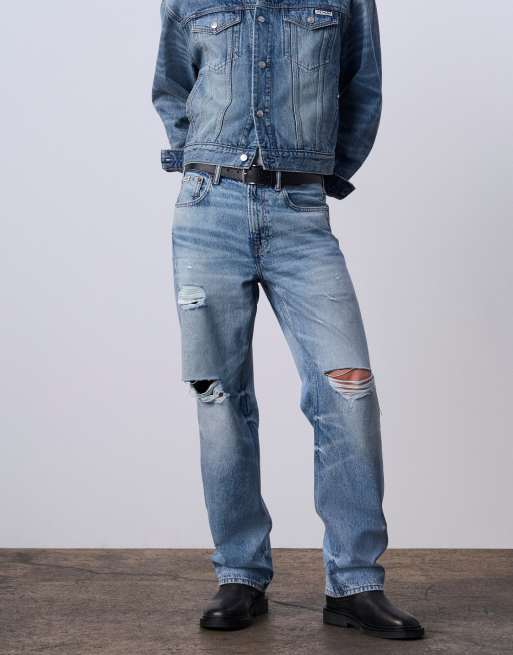 Jung Kook for Calvin Klein 90s straight leg jeans with rips in