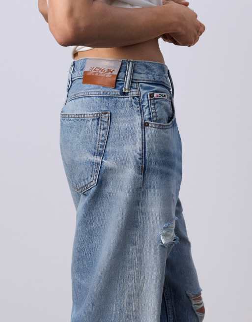 Jung Kook for Calvin Klein 90s straight leg jeans with rips in
