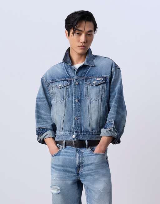 Jung Kook for Calvin Klein cropped trucker denim jacket in light