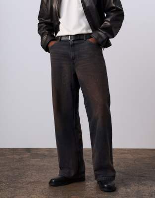Jung Kook for Calvin Klein high rise baggy jeans in brown acid 