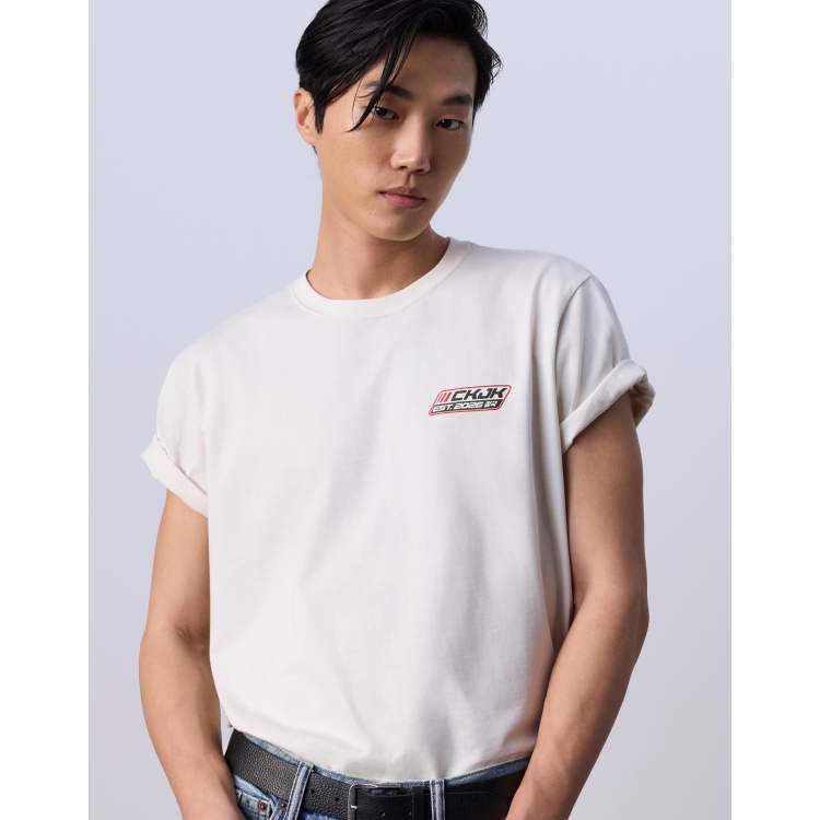Jung Kook for Calvin Klein racing badge graphic T-shirt in off